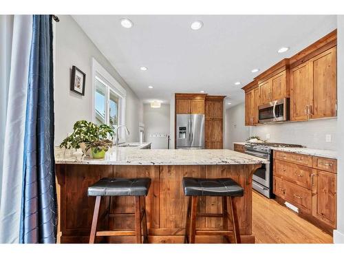 78 Gainsborough Drive Sw, Calgary, AB - Indoor Photo Showing Kitchen With Upgraded Kitchen