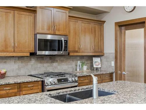 70 Valley Crest Rise Nw, Calgary, AB - Indoor Photo Showing Kitchen With Double Sink With Upgraded Kitchen