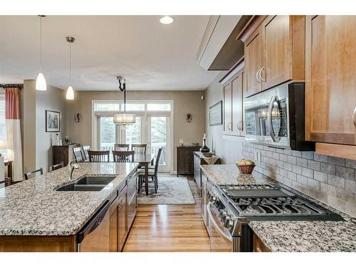 70 Valley Crest Rise Nw, Calgary, AB - Indoor Photo Showing Kitchen With Double Sink With Upgraded Kitchen