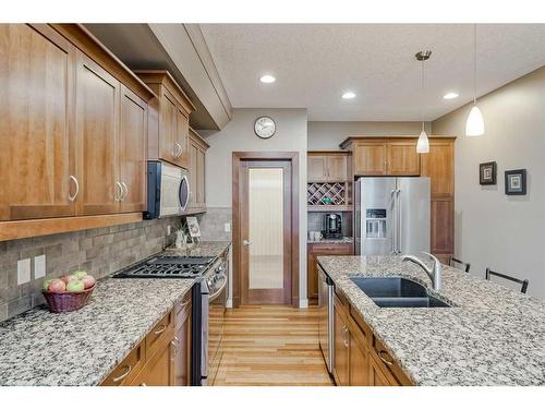 70 Valley Crest Rise Nw, Calgary, AB - Indoor Photo Showing Kitchen With Double Sink With Upgraded Kitchen