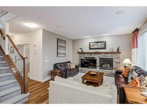 70 Valley Crest Rise Nw, Calgary, AB - Indoor Photo Showing Living Room With Fireplace