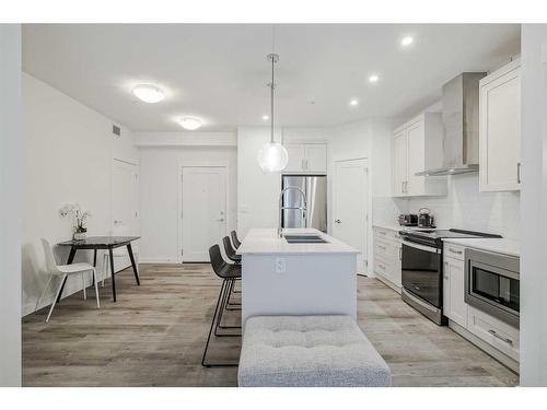 318-40 Walgrove Walk Se, Calgary, AB - Indoor Photo Showing Kitchen With Stainless Steel Kitchen With Upgraded Kitchen