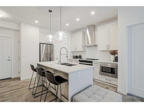 318-40 Walgrove Walk Se, Calgary, AB - Indoor Photo Showing Kitchen With Stainless Steel Kitchen With Double Sink With Upgraded Kitchen