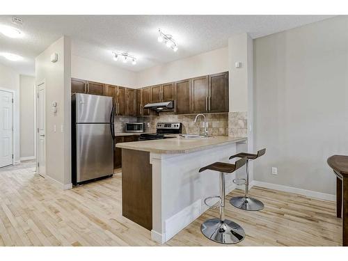 1212-155 Silverado Skies Link Sw, Calgary, AB - Indoor Photo Showing Kitchen With Upgraded Kitchen