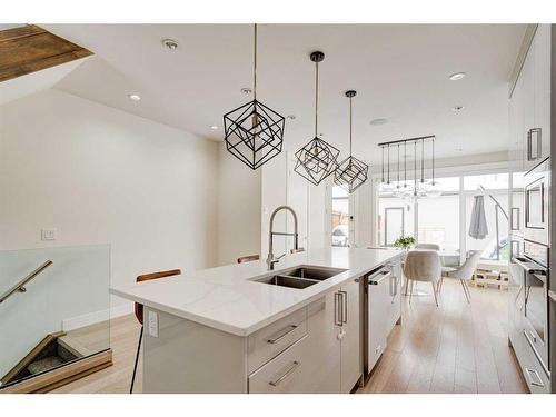 2557 21 Avenue Sw, Calgary, AB - Indoor Photo Showing Kitchen With Double Sink With Upgraded Kitchen