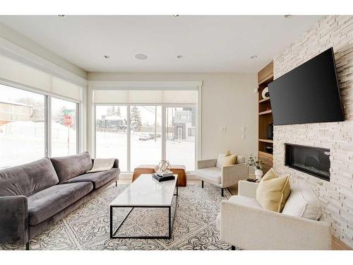 2557 21 Avenue Sw, Calgary, AB - Indoor Photo Showing Living Room With Fireplace