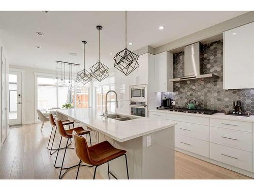 2557 21 Avenue Sw, Calgary, AB - Indoor Photo Showing Kitchen With Double Sink With Upgraded Kitchen