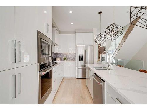 2557 21 Avenue Sw, Calgary, AB - Indoor Photo Showing Kitchen With Stainless Steel Kitchen With Double Sink With Upgraded Kitchen