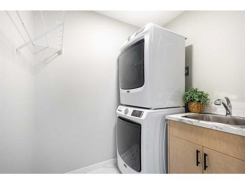 20 Royston Walk Nw, Calgary, AB - Indoor Photo Showing Laundry Room