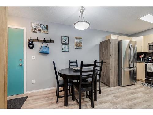 2120-60 Panatella Street Nw, Calgary, AB - Indoor Photo Showing Dining Room