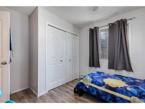 2120-60 Panatella Street Nw, Calgary, AB - Indoor Photo Showing Bedroom