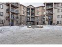 2120-60 Panatella Street Nw, Calgary, AB  - Outdoor With Facade 