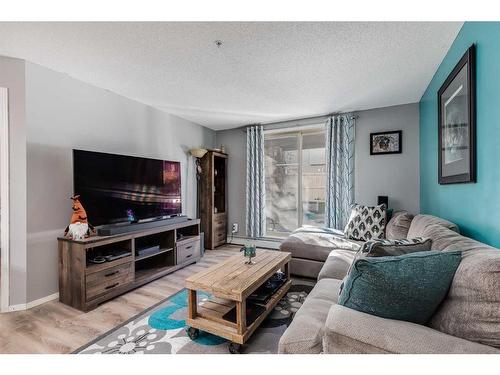 2120-60 Panatella Street Nw, Calgary, AB - Indoor Photo Showing Living Room