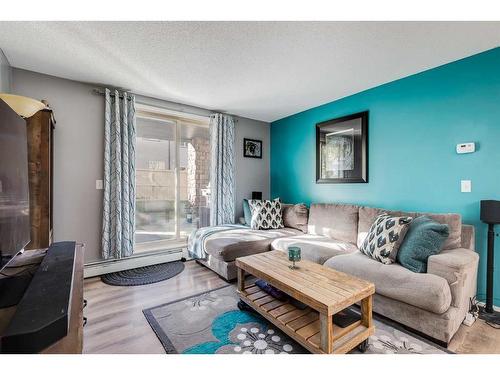 2120-60 Panatella Street Nw, Calgary, AB - Indoor Photo Showing Living Room