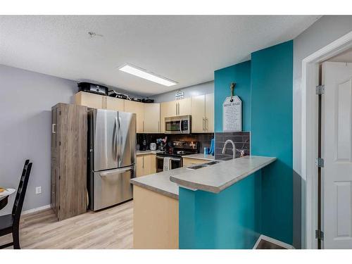 2120-60 Panatella Street Nw, Calgary, AB - Indoor Photo Showing Kitchen