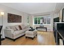 305-728 3 Avenue Nw, Calgary, AB  - Indoor Photo Showing Living Room 