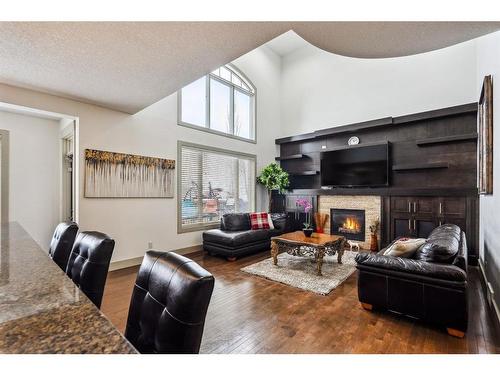 119 Wentworth Hill Sw, Calgary, AB - Indoor With Fireplace