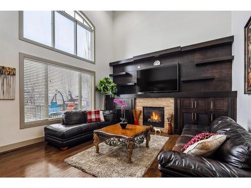 119 Wentworth Hill Sw, Calgary, AB - Indoor Photo Showing Living Room With Fireplace