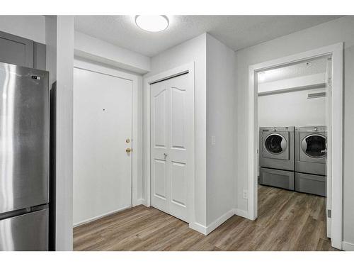 2108-12 Cimarron Common, Okotoks, AB - Indoor Photo Showing Laundry Room