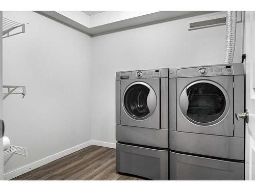 2108-12 Cimarron Common, Okotoks, AB - Indoor Photo Showing Laundry Room