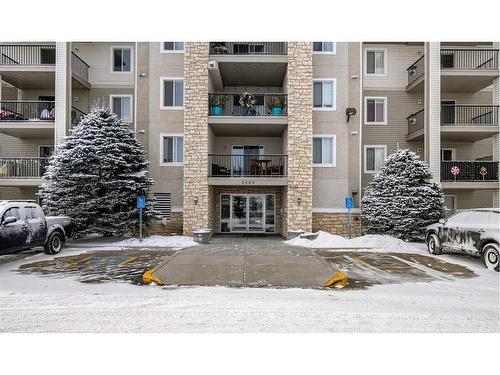 2108-12 Cimarron Common, Okotoks, AB - Outdoor With Balcony With Facade