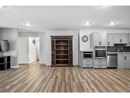 2108-12 Cimarron Common, Okotoks, AB - Indoor Photo Showing Kitchen