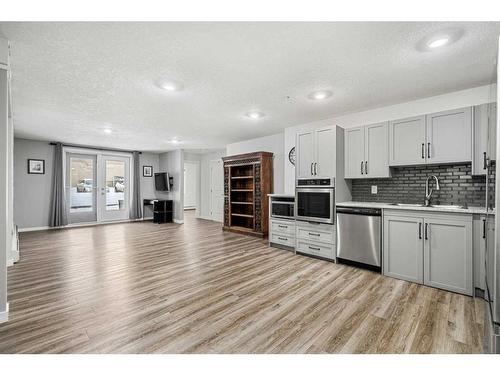 2108-12 Cimarron Common, Okotoks, AB - Indoor Photo Showing Kitchen