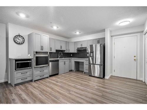 2108-12 Cimarron Common, Okotoks, AB - Indoor Photo Showing Kitchen