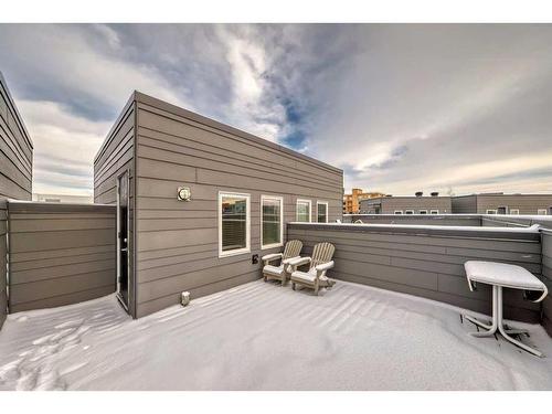 408-19500 37 Street Se, Calgary, AB - Outdoor With Deck Patio Veranda With Exterior