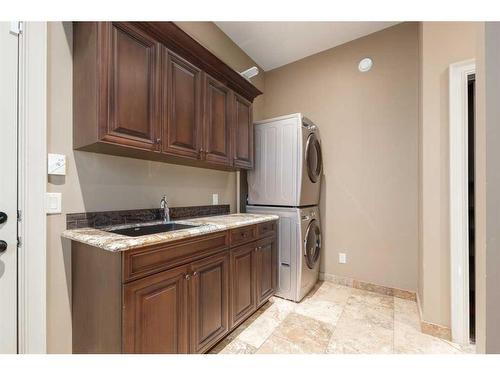 211 Aspen Ridge Place Sw, Calgary, AB - Indoor Photo Showing Laundry Room