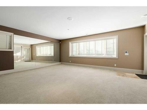 211 Aspen Ridge Place Sw, Calgary, AB - Indoor Photo Showing Other Room