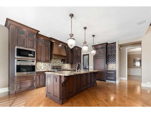 211 Aspen Ridge Place Sw, Calgary, AB - Indoor Photo Showing Kitchen With Upgraded Kitchen