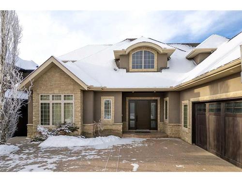 211 Aspen Ridge Place Sw, Calgary, AB - Outdoor With Facade