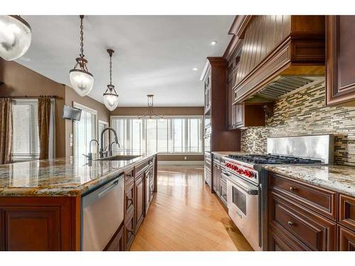 211 Aspen Ridge Place Sw, Calgary, AB - Indoor Photo Showing Kitchen With Upgraded Kitchen