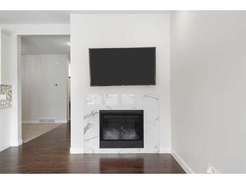 59 Saddlelake Manor Ne, Calgary, AB - Indoor Photo Showing Living Room With Fireplace