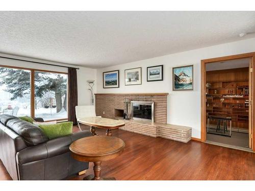 54 Wildwood Drive Sw, Calgary, AB - Indoor Photo Showing Living Room With Fireplace