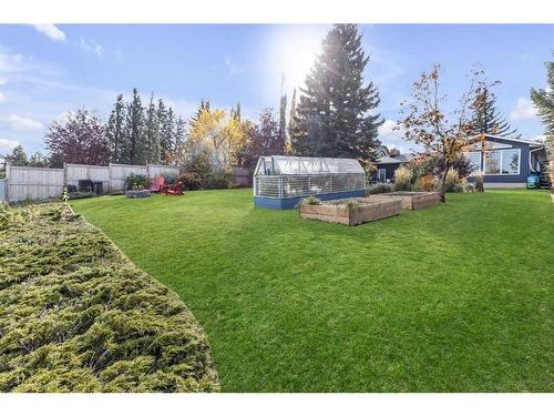 54 Wildwood Drive Sw, Calgary, AB - Outdoor With Backyard