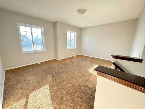 23 Chapman Green Se, Calgary, AB - Indoor Photo Showing Other Room