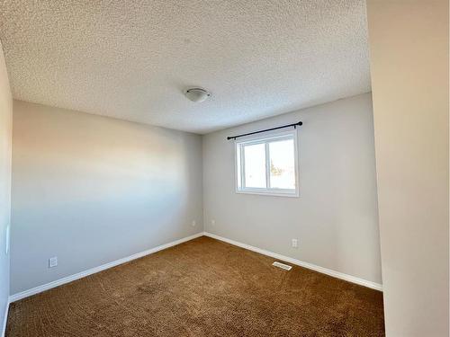 23 Chapman Green Se, Calgary, AB - Indoor Photo Showing Other Room