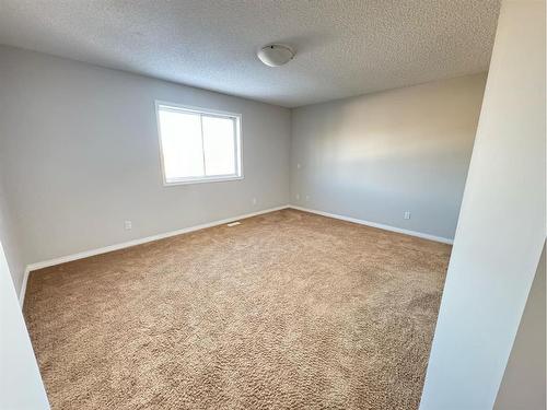 23 Chapman Green Se, Calgary, AB - Indoor Photo Showing Other Room