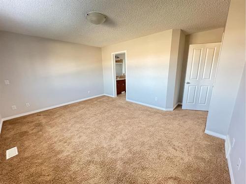 23 Chapman Green Se, Calgary, AB - Indoor Photo Showing Other Room