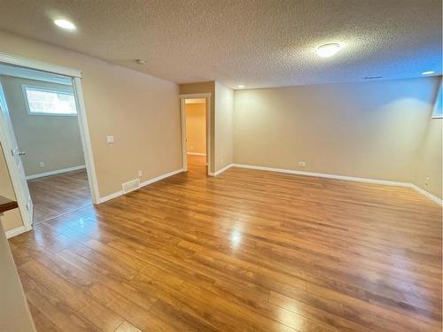 23 Chapman Green Se, Calgary, AB - Indoor Photo Showing Other Room