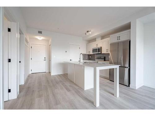 5104-200 Seton Circle Se, Calgary, AB - Indoor Photo Showing Kitchen