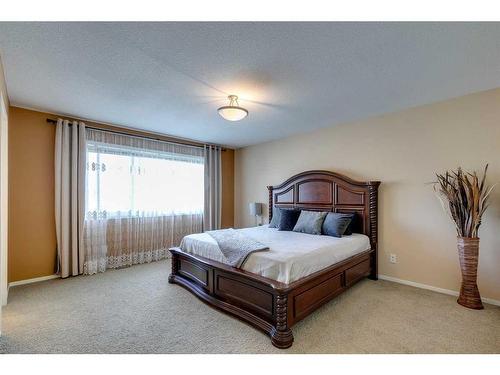 125 Copperstone Close Se, Calgary, AB - Indoor Photo Showing Bedroom