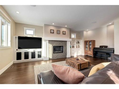 466 Brookside Court, Rural Rocky View County, AB - Indoor Photo Showing Living Room With Fireplace