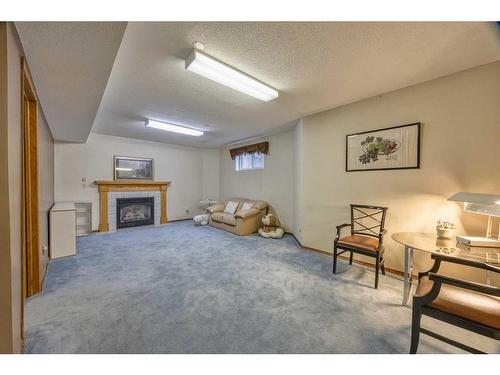 40 Edgepark Way Nw, Calgary, AB - Indoor Photo Showing Other Room With Fireplace