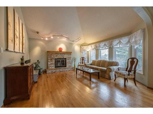 40 Edgepark Way Nw, Calgary, AB - Indoor Photo Showing Living Room With Fireplace