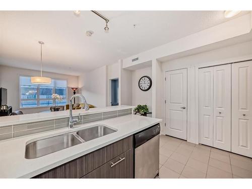 1201-175 Silverado Boulevard Sw, Calgary, AB - Indoor Photo Showing Kitchen With Double Sink