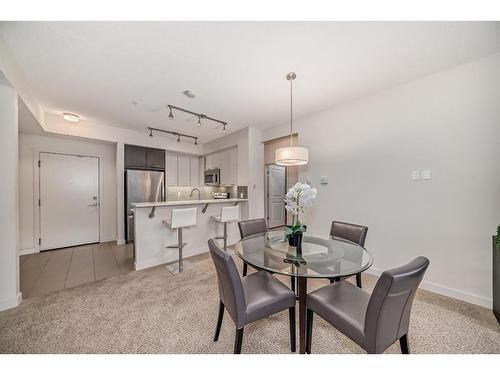 1201-175 Silverado Boulevard Sw, Calgary, AB - Indoor Photo Showing Dining Room