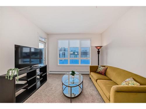 1201-175 Silverado Boulevard Sw, Calgary, AB - Indoor Photo Showing Living Room